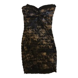 Womens black and tan lace strapless dress. Built in bra cups. Size xtra small.